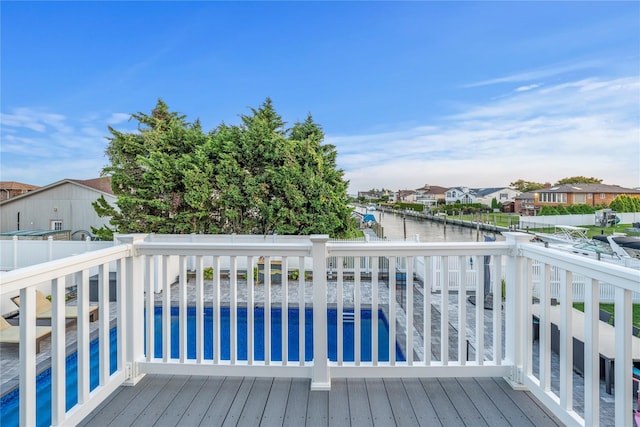 20 Skipper Dr, West Islip, NY 11795 - deck with an outdoor pool, a residential view, and a water view