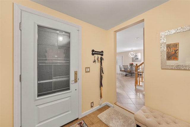 20 Skipper Dr, West Islip, NY 11795 - foyer entrance featuring tile patterned flooring and baseboards