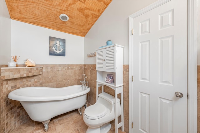 20 Skipper Dr, West Islip, NY 11795 - full bathroom featuring tile walls, wooden ceiling, vaulted ceiling, a freestanding bath, and wainscoting