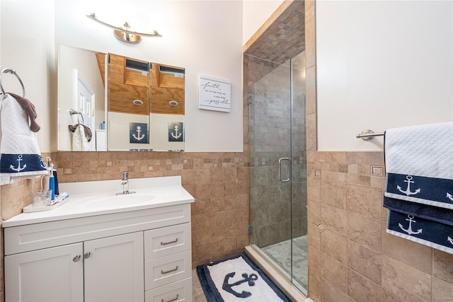 20 Skipper Dr, West Islip, NY 11795 - bathroom featuring tile walls, a shower stall, vanity, and a wainscoted wall
