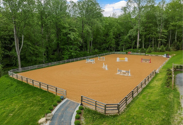 8 Lost Pond Ln, North Salem, NY 10560 - surrounding community with an enclosed riding area and a forest view