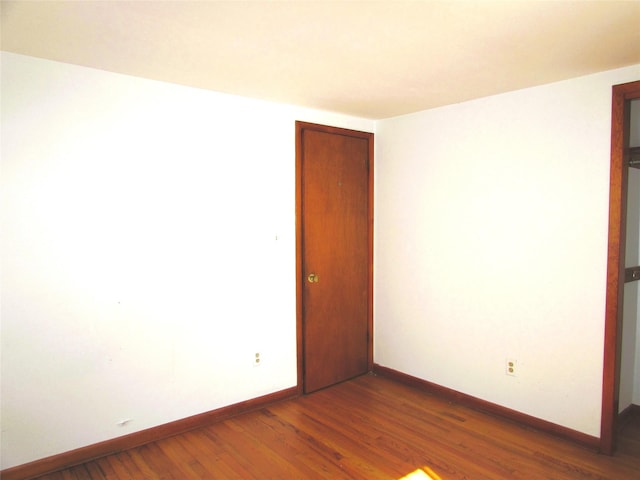 7 Holiday St, Pawling, NY 12564 - unfurnished room featuring baseboards and dark wood-type flooring