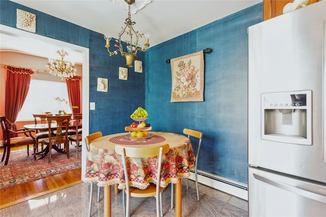 429 E Park Ave, Long Beach, NY 11561 - dining room with a chandelier and a baseboard heating unit