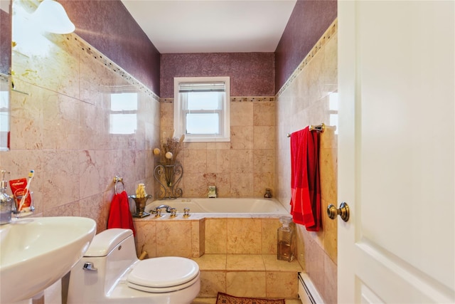 429 E Park Ave, Long Beach, NY 11561 - full bath featuring tile walls, toilet, a garden tub, a baseboard heating unit, and a sink