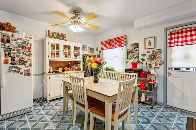 429 E Park Ave, Long Beach, NY 11561 - dining area featuring a ceiling fan and dark floors