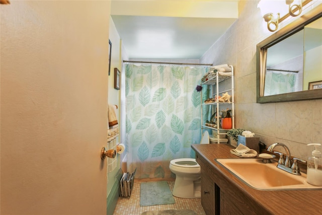 429 E Park Ave, Long Beach, NY 11561 - full bath with toilet, tile patterned floors, tile walls, a shower with curtain, and vanity
