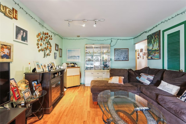 429 E Park Ave, Long Beach, NY 11561 - living area featuring wood finished floors and rail lighting