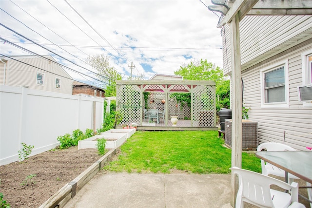 429 E Park Ave, Long Beach, NY 11561 - view of yard with a garden, a deck, central AC unit, and a patio area