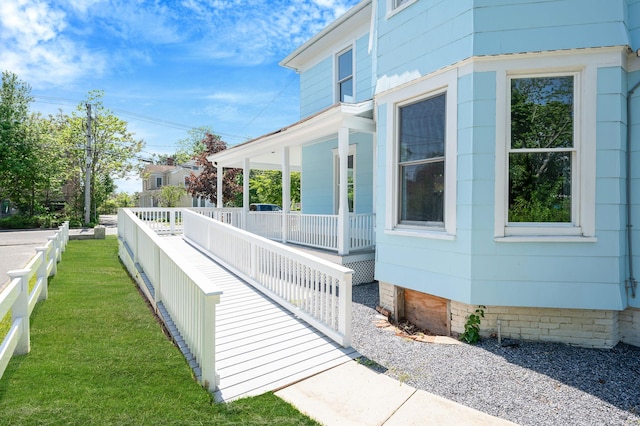 434 Griffing Ave, Riverhead, NY 11901 - view of property exterior with covered porch and crawl space