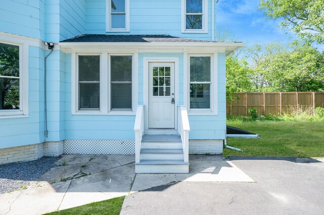 434 Griffing Ave, Riverhead, NY 11901 - doorway to property featuring roof with shingles