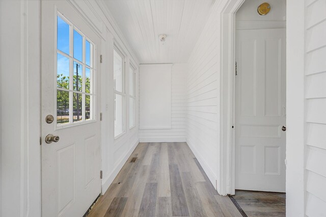 434 Griffing Ave, Riverhead, NY 11901 - doorway to outside featuring wood finished floors and baseboards