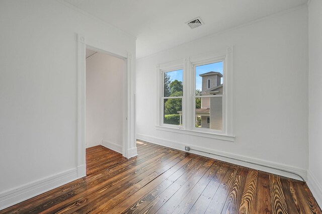 434 Griffing Ave, Riverhead, NY 11901 - spare room with ornamental molding, hardwood / wood-style flooring, and baseboards