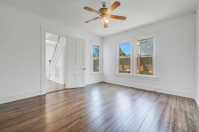 434 Griffing Ave, Riverhead, NY 11901 - spare room featuring a ceiling fan, wood-type flooring, and baseboards