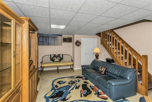 71-14 Sutton Pl Unit 1, Fresh Meadows, NY 11365 - living room featuring stairway, baseboards, and a paneled ceiling