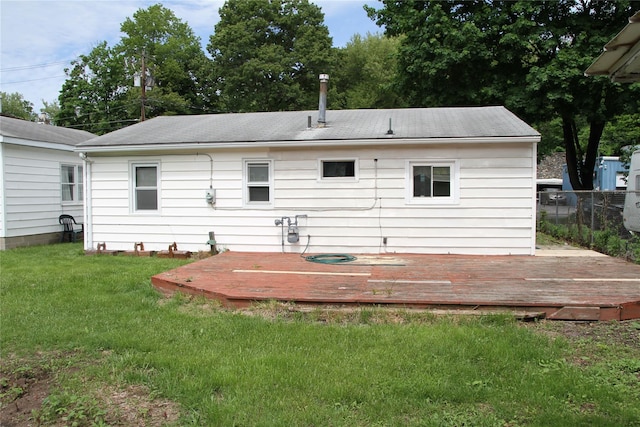 73 Barcelow St, Port Jervis, NY 12771 - rear view of house with a deck and roof with shingles