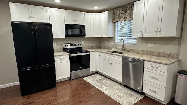674 Sackett Lake Rd, Monticello, NY 12701 - kitchen featuring black appliances, a sink, dark wood-type flooring, white cabinets, and recessed lighting