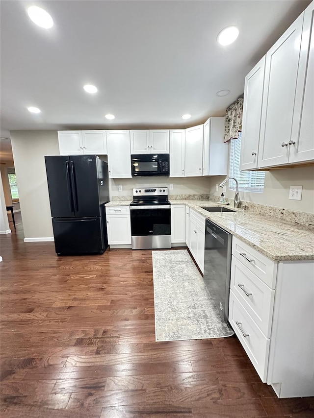674 Sackett Lake Rd, Monticello, NY 12701 - kitchen featuring black appliances, a sink, white cabinets, and recessed lighting