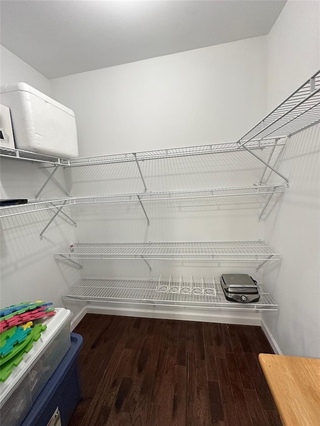 674 Sackett Lake Rd, Monticello, NY 12701 - walk in closet with wood finished floors