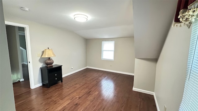 674 Sackett Lake Rd, Monticello, NY 12701 - empty room featuring dark wood-type flooring, baseboards, and a smoke detector