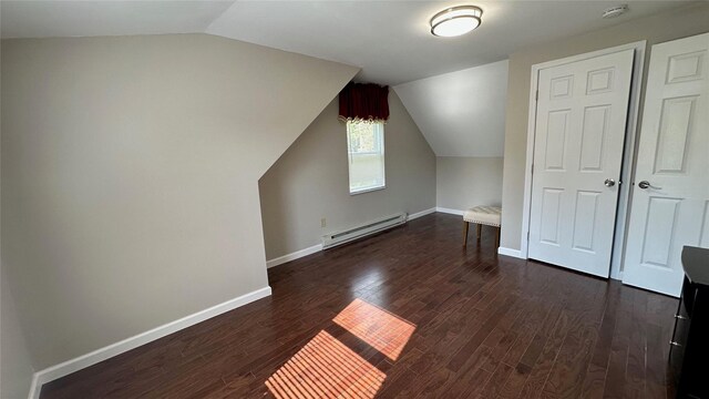 674 Sackett Lake Rd, Monticello, NY 12701 - bonus room with baseboard heating, vaulted ceiling, dark wood finished floors, and baseboards