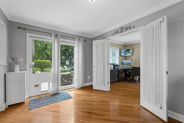7 Lincoln Dr, Washingtonville, NY 10992 - entryway featuring a desk, wood finished floors, french doors, baseboards, and ornamental molding