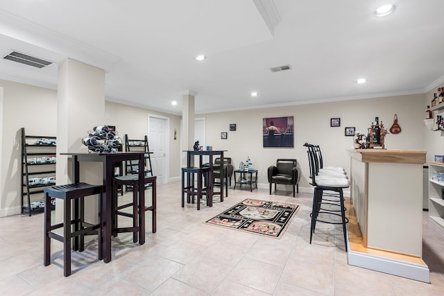 50 Stallion Trl, Brewster, NY 10509 - dining room featuring recessed lighting, crown molding, a dry bar, and light tile patterned floors