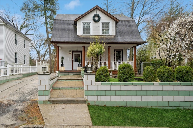 11 Bridge St, Suffern, NY 10901 - colonial inspired home featuring a porch and a shingled roof