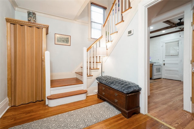 11 Bridge St, Suffern, NY 10901 - stairs with wood finished floors, a ceiling fan, ornamental molding, and recessed lighting
