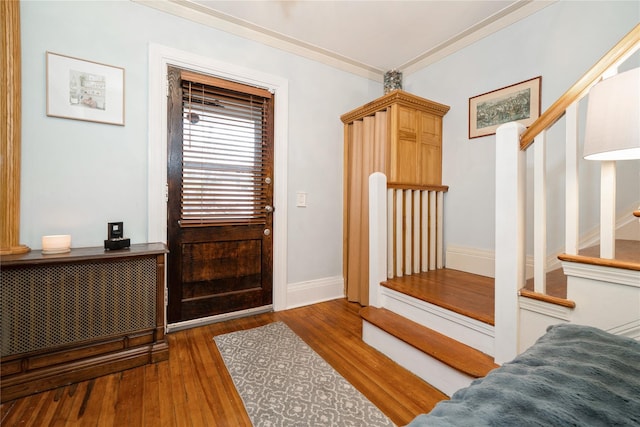 11 Bridge St, Suffern, NY 10901 - entrance foyer featuring stairs, wood finished floors, and ornamental molding