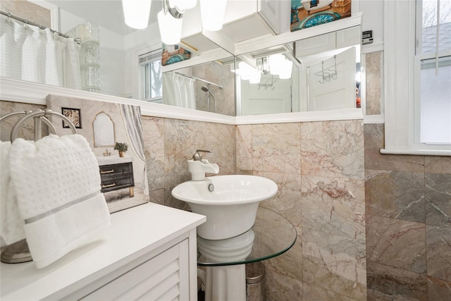 11 Bridge St, Suffern, NY 10901 - bathroom with tile walls and a shower with shower curtain