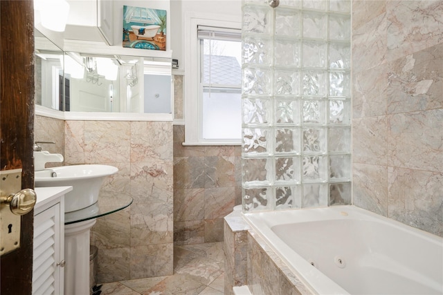 11 Bridge St, Suffern, NY 10901 - bathroom with tile walls, a whirlpool tub, and vanity