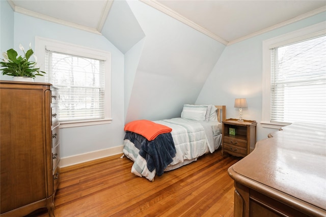 11 Bridge St, Suffern, NY 10901 - bedroom with hardwood / wood-style floors, crown molding, and lofted ceiling