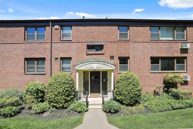 127 Beacon Hill Dr Unit F 13, Dobbs Ferry, NY 10522 - view of front of house featuring brick siding and cooling unit