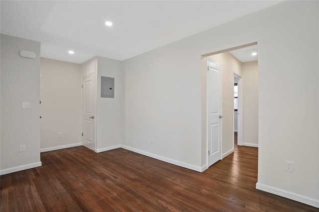127 Beacon Hill Dr Unit F 13, Dobbs Ferry, NY 10522 - empty room with electric panel, wood finished floors, baseboards, and recessed lighting