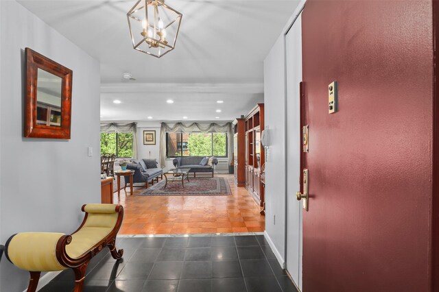 25 Lake St Unit 7K & 7L, White Plains, NY 10603 - corridor with a chandelier, baseboards, recessed lighting, and dark tile patterned flooring