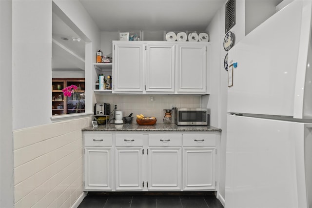 25 Lake St Unit 7K & 7L, White Plains, NY 10603 - kitchen with freestanding refrigerator, stainless steel microwave, and white cabinets