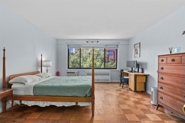 25 Lake St Unit 7K & 7L, White Plains, NY 10603 - bedroom with radiator, an office area, a wall unit AC, and baseboards