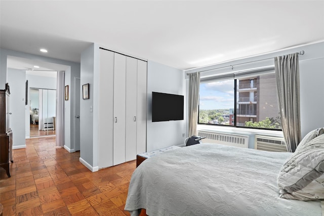 25 Lake St Unit 7K & 7L, White Plains, NY 10603 - bedroom with radiator, a closet, baseboards, and recessed lighting