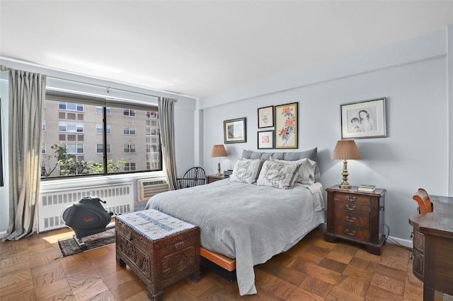 25 Lake St Unit 7K & 7L, White Plains, NY 10603 - bedroom featuring radiator heating unit and an AC wall unit