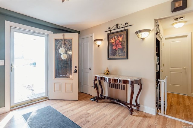 47 Myson St, West Islip, NY 11795 - foyer entrance featuring light wood finished floors