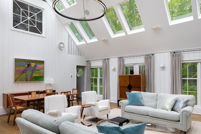 149 Washington Spring Rd, Palisades, NY 10964 - living room featuring a skylight, vaulted ceiling, plenty of natural light, and wood finished floors