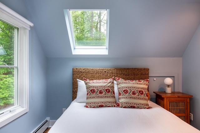 149 Washington Spring Rd, Palisades, NY 10964 - bedroom featuring a baseboard radiator, lofted ceiling, multiple windows, and a skylight