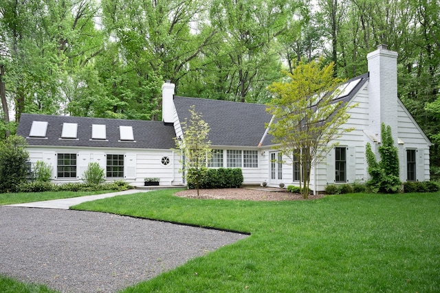 149 Washington Spring Rd, Palisades, NY 10964 - new england style home with a chimney, a front lawn, roof with shingles, and french doors