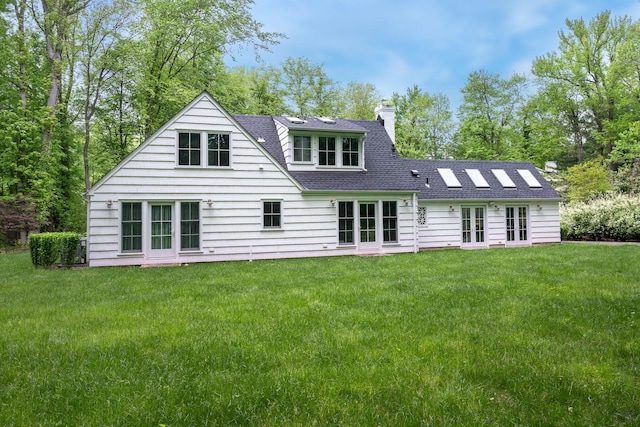 149 Washington Spring Rd, Palisades, NY 10964 - back of property with french doors, a chimney, a lawn, and roof with shingles