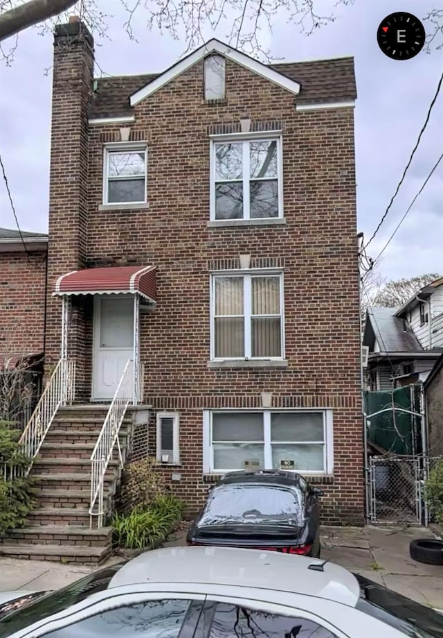 3924 Duryea Ave, Bronx, NY 10466 - view of front of property with brick siding and a chimney