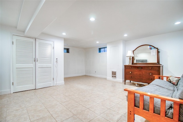 102 Barbara St, Staten Island, NY 10306 - bedroom with recessed lighting, light tile patterned flooring, baseboards, and a closet