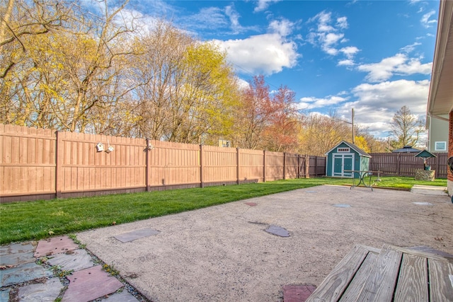 102 Barbara St, Staten Island, NY 10306 - fenced backyard featuring a patio area