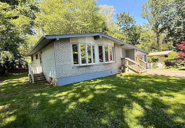123 Helene Rd, Valley Cottage, NY 10989 - view of front of home featuring brick siding, a front yard, and entry steps