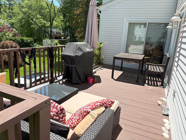 13 Romar Ave, White Plains, NY 10605 - wooden deck with a grill and an outdoor hangout area