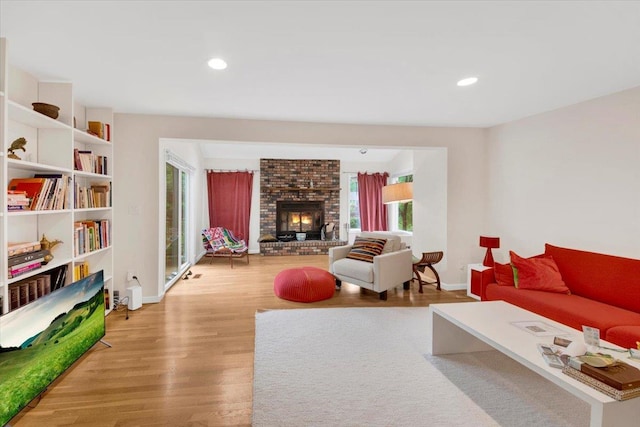 13 Romar Ave, White Plains, NY 10605 - living area featuring wood finished floors, a fireplace, baseboards, and recessed lighting